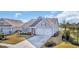 Beautifully landscaped home with a two-car garage and a spacious driveway in a quiet neighborhood at 804 Yauhannah Dr., Little River, SC 29566