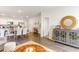 Dining room area showcasing an open floor plan to the kitchen with a stylish sideboard at 8081 Bear Claw Way, Conway, SC 29526