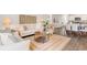Open-concept living and dining area featuring modern decor and hardwood floors at 8081 Bear Claw Way, Conway, SC 29526