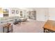 Bright living room with a sectional sofa, a plush ottoman, and plenty of room for activities at 8081 Bear Claw Way, Conway, SC 29526