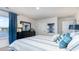Bright bedroom with lake view, comfortable bed, and stylish decor at 8085 Bear Claw Way, Conway, SC 29526