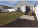 Wide backyard with dark mulch and a white fence enclosing the area at 1001 Leatherman Rd., Conway, SC 29527