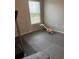 This workout room has neutral walls, rubber flooring, and a window letting in light at 1001 Leatherman Rd., Conway, SC 29527