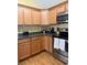 Kitchen features stainless steel appliances, light wood cabinets, and a dark countertop at 1001 Leatherman Rd., Conway, SC 29527