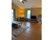 Comfortable living room featuring hardwood floors, neutral walls, and ample natural light at 1001 Leatherman Rd., Conway, SC 29527