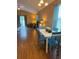 Open floor plan featuring dining area with hardwood floors, vaulted ceilings, and easy access to living room at 1001 Leatherman Rd., Conway, SC 29527