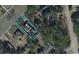 Aerial view highlighting the property boundaries, nearby trees, and proximity to the road at 5616 N Kings Hwy., Myrtle Beach, SC 29577