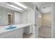 Bathroom featuring a large mirror, vanity area and doorway into another room at 5616 N Kings Hwy., Myrtle Beach, SC 29577