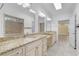 Bright bathroom with granite counters, dual sinks, and an elegant design at 5616 N Kings Hwy., Myrtle Beach, SC 29577