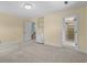 Neutral bedroom with built-in shelving, carpet, and closet space, ready for personalization at 5616 N Kings Hwy., Myrtle Beach, SC 29577