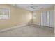 Comfortable bedroom featuring neutral colored walls, carpet, and double windows at 5616 N Kings Hwy., Myrtle Beach, SC 29577