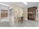 Dining area with built-in desk and bright, open connection to the living room at 5616 N Kings Hwy., Myrtle Beach, SC 29577