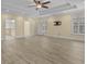 Expansive bedroom with tray ceilings, recessed lighting, and new wood-look flooring at 5616 N Kings Hwy., Myrtle Beach, SC 29577
