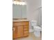 Bathroom with vanity and sink, granite countertops, matching fixtures and toilet at 129 Waterfall Circle, Little River, SC 29566
