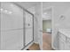 Sleek bathroom with glass shower enclosure and neutral toned tile flooring at 3304 Candytuft Dr., Conway, SC 29526