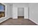 Spacious bedroom with wood-look floors and closet entrance at 3304 Candytuft Dr., Conway, SC 29526