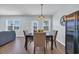 Dining area features a stylish table set and large windows with water views at 3304 Candytuft Dr., Conway, SC 29526