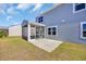 Back exterior view of home featuring a screened in porch and attached patio at 3304 Candytuft Dr., Conway, SC 29526