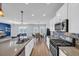 Open kitchen with island flows into dining and living areas with stunning water view at 3304 Candytuft Dr., Conway, SC 29526