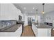 Modern kitchen boasts stainless steel appliances, ample counter space, and sleek cabinetry at 3304 Candytuft Dr., Conway, SC 29526