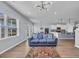 Open concept living room with water views, seamlessly connecting to the kitchen at 3304 Candytuft Dr., Conway, SC 29526
