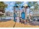 Community playground is surrounded by a safety fence and wood chips at 3304 Candytuft Dr., Conway, SC 29526