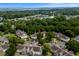Aerial view of a residential neighborhood with lush green trees and well-maintained homes at 4305 Lotus Ct. # G, Murrells Inlet, SC 29576