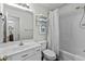 Bright bathroom featuring a shower-tub combo, modern vanity, and updated fixtures at 4305 Lotus Ct. # G, Murrells Inlet, SC 29576