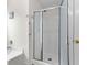 Bathroom with a shower featuring glass doors and a hand rail at 4305 Lotus Ct. # G, Murrells Inlet, SC 29576