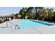 The large, inviting community pool is surrounded by a secure fence and mature trees at 4305 Lotus Ct. # G, Murrells Inlet, SC 29576
