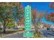 The Riverwood community sign displays a well-kept entrance on a clear and sunny day at 4305 Lotus Ct. # G, Murrells Inlet, SC 29576