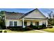 Exterior view of home with landscaped yard at 4305 Lotus Ct. # G, Murrells Inlet, SC 29576