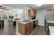 Kitchen featuring modern appliances and an open view into the adjacent living area at 4305 Lotus Ct. # G, Murrells Inlet, SC 29576