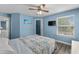 Serene main bedroom with ensuite bathroom, ceiling fan, and closet space at 4305 Lotus Ct. # G, Murrells Inlet, SC 29576