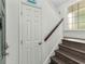 Bright entryway with a wooden staircase featuring a modern design and ample natural light at 4305 Lotus Ct. # G, Murrells Inlet, SC 29576