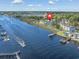 Scenic aerial view of riverside condo community with convenient waterway access, docks, and scenic views at 4616 Greenbriar Dr. # H8, Little River, SC 29566