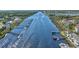 Expansive aerial view of waterway, condo community, and docks, offering a scenic coastal lifestyle at 4616 Greenbriar Dr. # H8, Little River, SC 29566