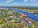 Panoramic aerial view showcasing waterfront condos, lush surroundings, and convenient waterway access at 4616 Greenbriar Dr. # H8, Little River, SC 29566