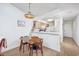 Cozy dining area with modern table and chairs, adjacent to the kitchen at 4616 Greenbriar Dr. # H8, Little River, SC 29566