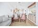 Bright living room with views of the dining area and access to kitchen at 4616 Greenbriar Dr. # H8, Little River, SC 29566