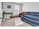 A simply decorated bedroom is bright with sunshine and furnished with a twin bed at 511 Mcalister Dr., Little River, SC 29566