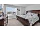 Comfortable bedroom with a large window that provides plenty of natural light at 511 Mcalister Dr., Little River, SC 29566