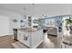 Spacious kitchen with granite island open to the living room and breakfast area at 511 Mcalister Dr., Little River, SC 29566