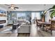 Inviting living room featuring a fireplace, built-ins, and water views at 511 Mcalister Dr., Little River, SC 29566