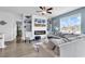 Comfortable living room with a fireplace and built-in shelving at 511 Mcalister Dr., Little River, SC 29566