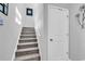 Carpeted staircase leading to the upper level at 511 Mcalister Dr., Little River, SC 29566