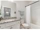 Bathroom featuring granite countertops, white cabinets, and a shower/tub combination at 5834 Cremona Dr., Myrtle Beach, SC 29577