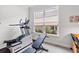 This exercise room features a treadmill and bench for a healthy lifestyle at 5834 Cremona Dr., Myrtle Beach, SC 29577