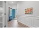 Welcoming foyer with paneled wall accents and a view of the bright blue exterior at 5834 Cremona Dr., Myrtle Beach, SC 29577