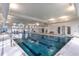 Indoor pool with lap lanes, flags and benches; a great amenity at 5834 Cremona Dr., Myrtle Beach, SC 29577